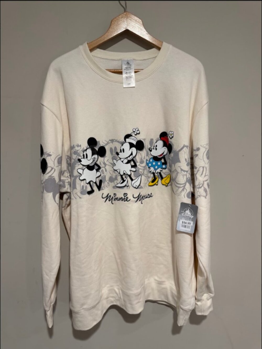 Disney Minnie Mouse Cream Sweater with Black, Blue, Yellow Accents